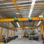 Overhead crane with dual hoists installed in an Australian industrial workshop by National Crane Solutions